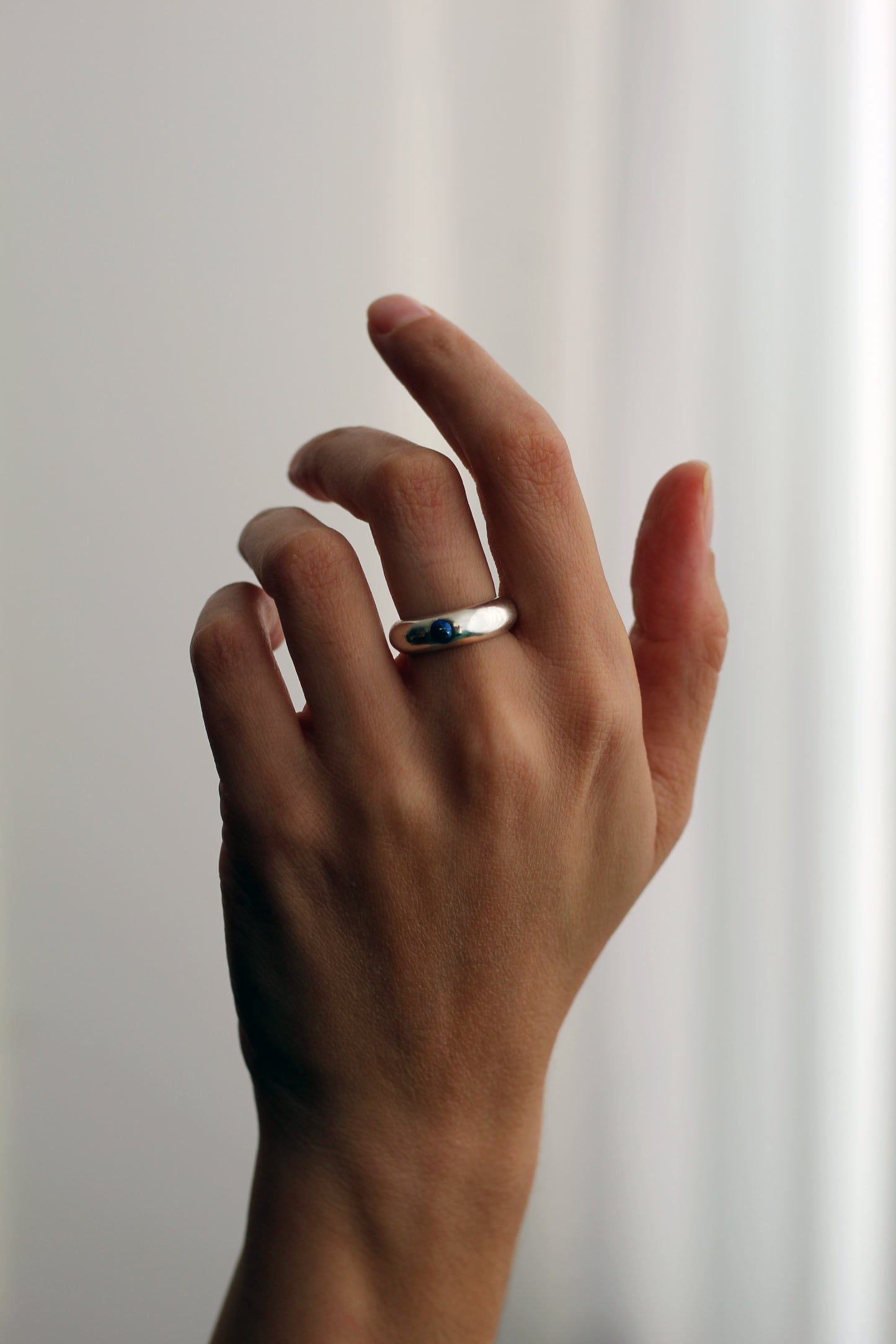 Silver Donut ring set with Lapis Lazuli